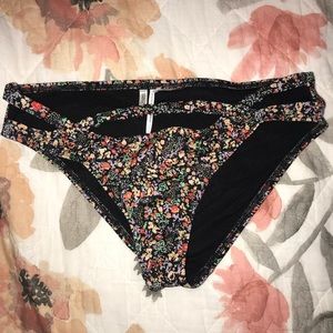 Floral Black bikini bottom with cut-outs